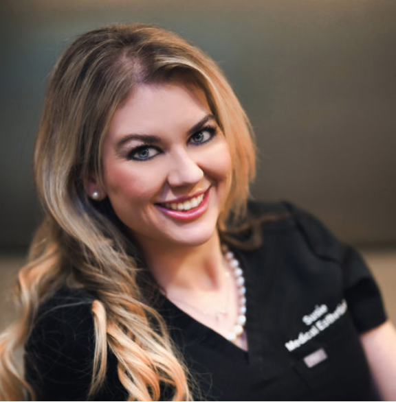 Susie in black scrubs